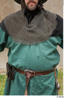  Photos Medieval Guard in mail armor 4 Medieval clothing Medieval guard chainmail hood green gambeson leather bag leather belt upper body 0002.jpg
